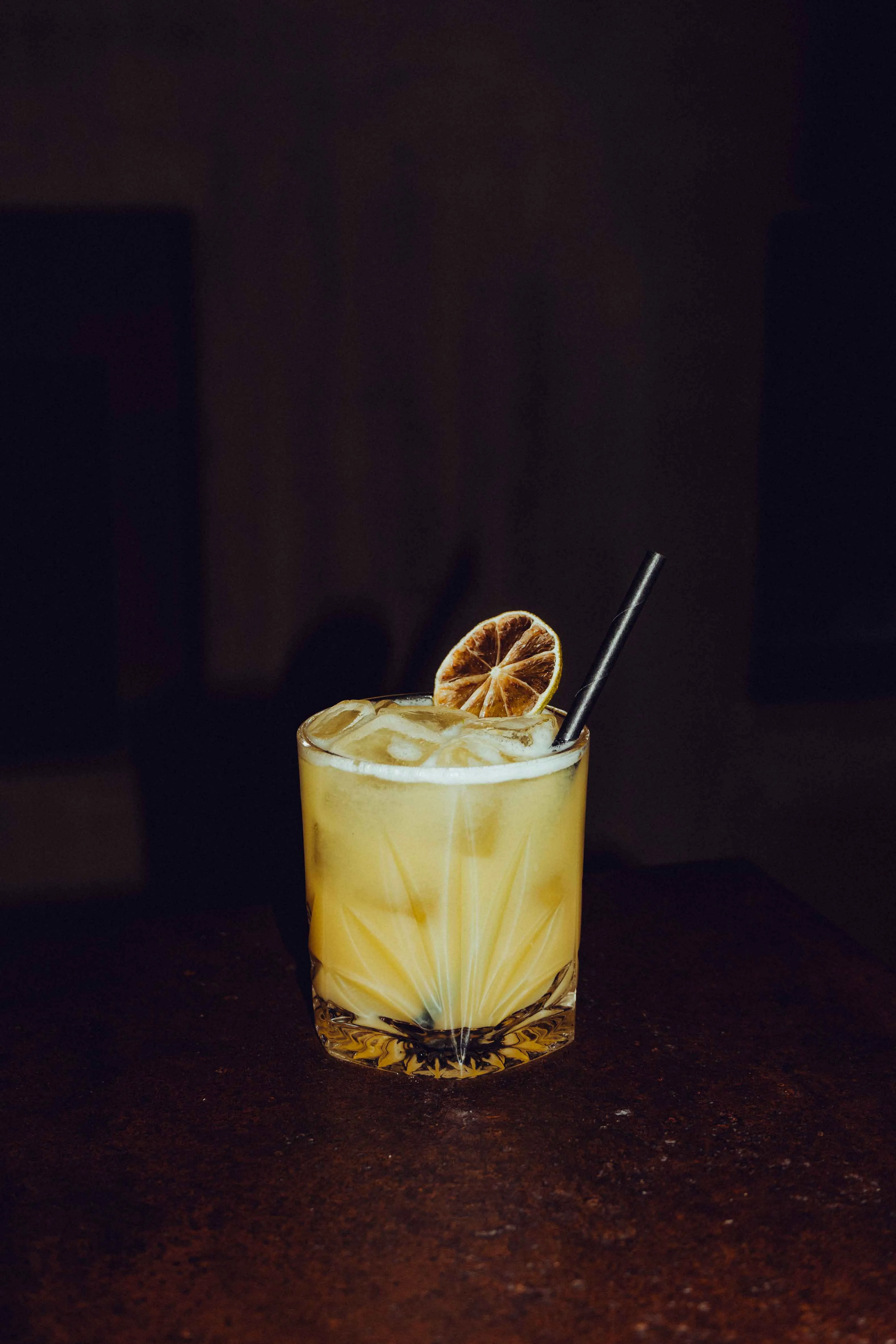 Cocktail mit Orangenscheibe